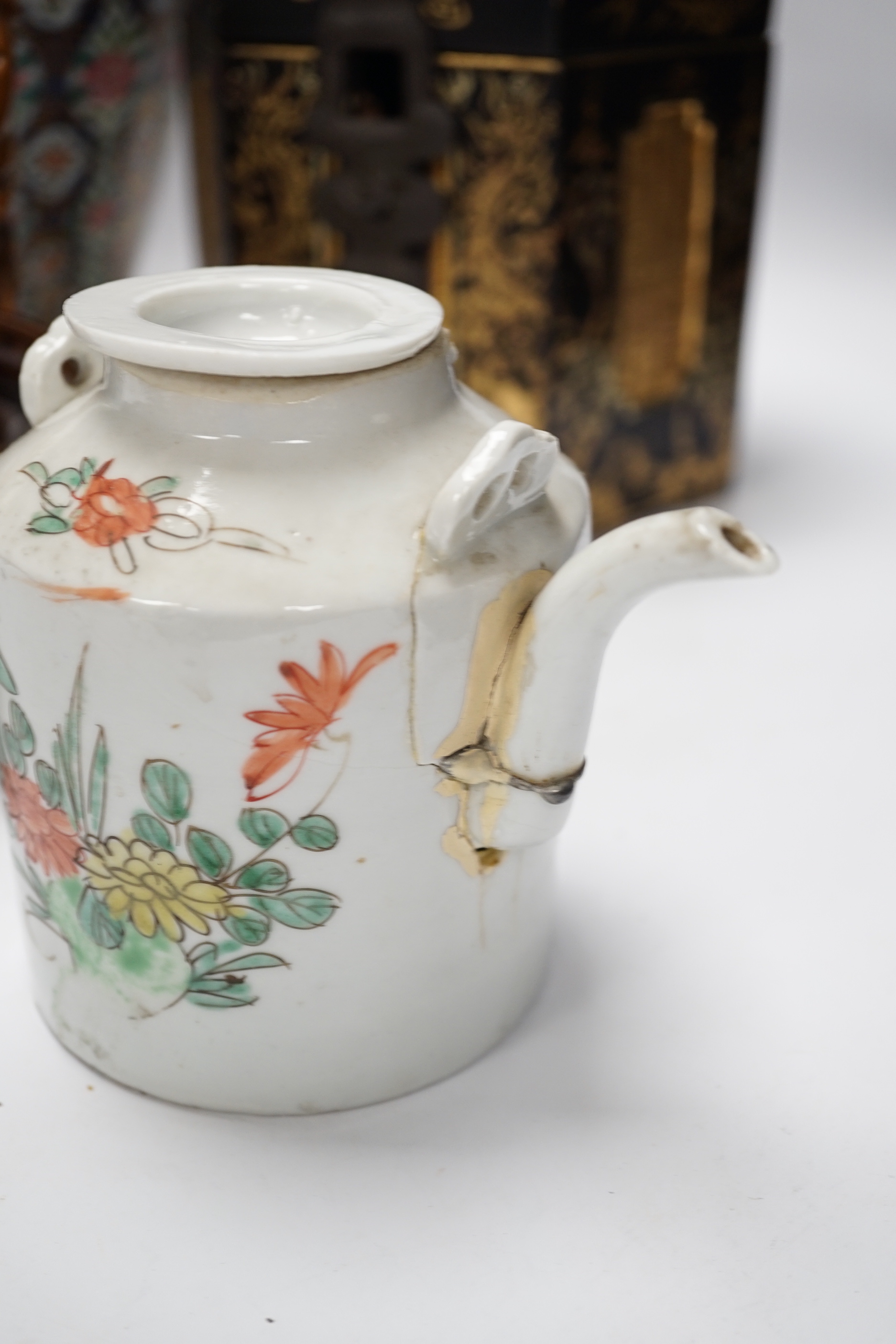 A group of Chinese items including a hardwood carving of luohan, an 18th century blue and white jar, a lacquer box, etc.